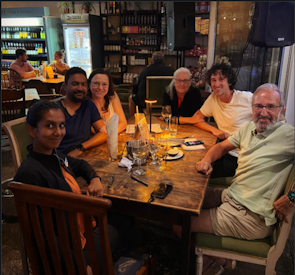 Farina guests around a table